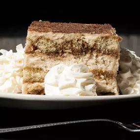 Classic tiramisu from Bambinelli’s Pizza & Pasta—light, creamy, and the perfect ending after pizza in Atlanta or pasta near me. A must-try dessert from one of the best Italian restaurants in Atlanta.