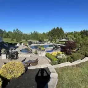 Beautiful pool landscape design by JCrew Landscaping. Servicing Rush, Chili, Brighton, Greece, Victor, Webster, Fairport, Penfield, Henrietta, West Henrietta, Pittsford, Canandaigua, Honeoye Falls and surrounding towns in Monroe County, NY