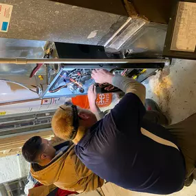 two Technicians working ac-repair-gladstone-mo