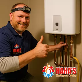 technician finishing installing water heater in lenexa, ks