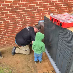 The Dependable HVAC team finishing a packaged unit installation in Mount Gilead, NC — trusted local HVAC experts serving families and homes with care.