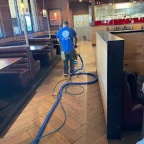 Trend Service employee working on a floor