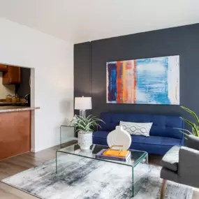 The living room at Midtown at Seneca Apartments offers a spacious, light-filled area for relaxation and socializing.