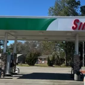Sinclair gas station fueling island
