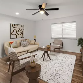 A living room with a couch, chairs, and a rug.