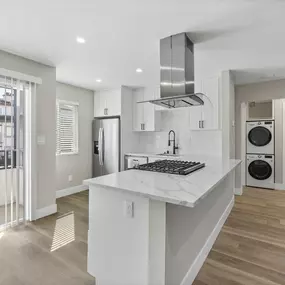 a view of a mirrored wall with triangles on it