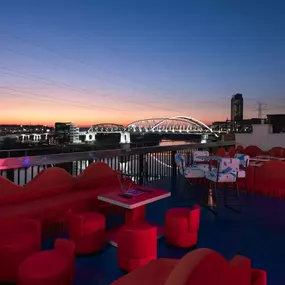 Golden hour on the rooftop hits different when you’ve got skyline views, a craft cocktail in hand, and the best seat in Nashville.