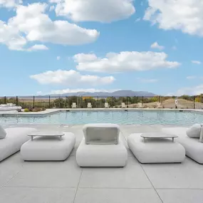 Swimming pool with relaxing chairs