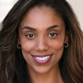 Portrait of a 30-something Black woman with radiant skin—real TMC patient who completed a GLP-1 program supervised by our board-certified NP in Marietta, Georgia.