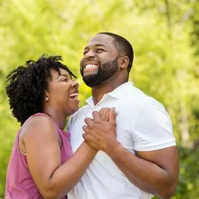 Joyful pair (30s) illustrate inclusive, culturally sensitive care and individualized macros plan guided by our RD and NP.
