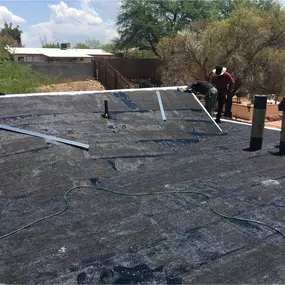 Hot Asphalt Roof Replacement by Universal Roofing LLC in Tucson, AZ
Universal Roofing LLC recently completed a hot asphalt built-up roof replacement on a commercial property in Tucson, AZ. This multi-ply roofing system uses layers of fiberglass felt and hot asphalt to create a durable, weather-resistant barrier ideal for flat and low-slope roofs. We removed the failing roof, prepped the substrate, and installed a high-performance BUR system designed to handle Tucson’s intense sun and seasonal st