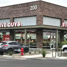 Exterior photograph of the Five Guys restaurant at 37666 North Gantzel Road in Queen Creek, Arizona.