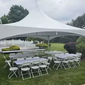 20x20 High Peak Tent with tables and chairs