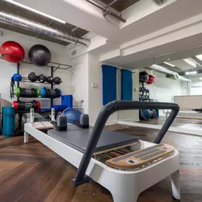 Pilates reformer studio at Riva Apartments in Santa Monica, CA, featuring state-of-the-art equipment in a bright, modern fitness space.