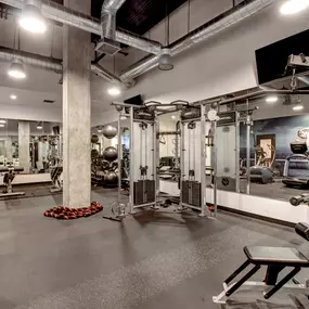 State-of-the-art fitness center at Harlow luxury apartments in Culver City, featuring modern workout equipment and spacious areas for exercise.