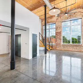 A large open room with a staircase