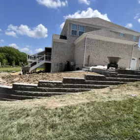 The backyard of this home in Springboro was too steep. It needed a retaining wall to give part of the yard a more gradual incline. We were able to come in and dig a footer, build the retaining wall and back fill behind it, creating a more usable area for the family. Do you have a backyard that needs a retaining wall? We can help. Visit our website to learn more.