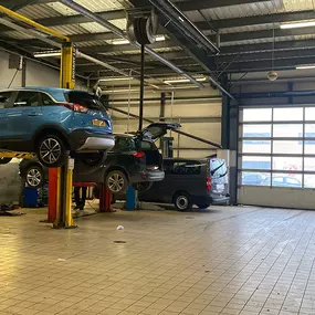 Cars inside the Vauxhall Service Centre Hull West workshop