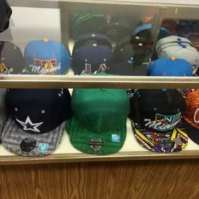 Top off your fit with a fresh snapback or bucket hat from Manhattan Transfer Inc. in Buffalo, MN. Come through and crown your style today.
