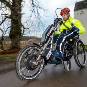 Rolling Buttons Rollstuhldecke für Handbike
