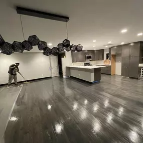 Refreshing grey floor coating applied for a modern, durable finish — perfect for Colorado homes.