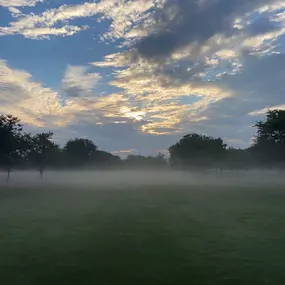 Early morning fog blankets the fairway at Audubon Golf Course.