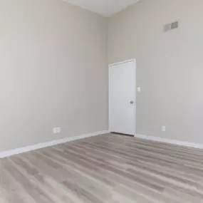 interior bedroom with hardwood floors