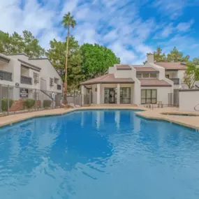 outdoor pool with desk and hotub