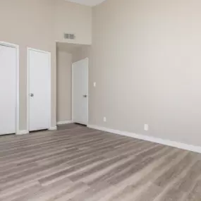 apartment bedroom interior with hardwood floors
