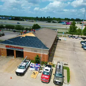 Houston roof installation underway for major commercial client, Firestone.