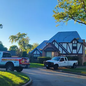 Houston roofing team and client join Northwest Chamber of Commerce after roof repair for community support.