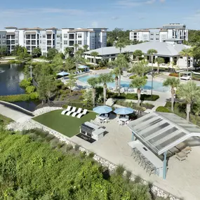 camden clearwater apartments clearwater, fl pool, outdoor grill, and pond