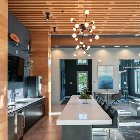 Camden Clearwater apartments indoor resident lounge with entertaining kitchen