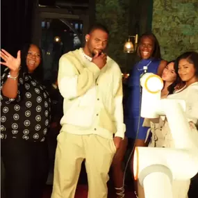 Micah Parsons from the Dallas Cowboys and his family on the GlamBot