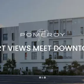 The Pomeroy Apartments showcase a sleek exterior design in a vibrant downtown setting.