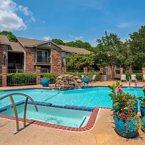Resort-style pool & Sundeck with Waterfall