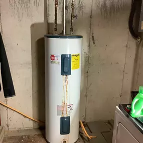 Old Leaky Water Heater - The average lifespan of tank style water heaters is 8 to 12 years.