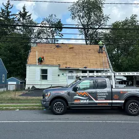 My Way Construction crew installing  new roof in Metuchen, NJ