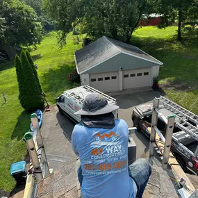 My Way Construction crew repairing roof in Cresskill, NJ