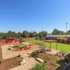Large outdoor picnic area with covered grilling stations.