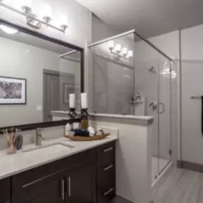 Spacious Bathroom with Stand-Up Shower and Quartz Countertops.