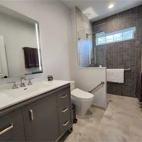 In-law bathroom - Our client had a main level bathroom that supports a bedroom and also is the 