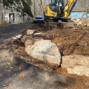 Retaining Wall Construction
When your property needs structure, stability, and erosion control, a well-built retaining wall makes all the difference. At AJ&J Excavation, we specialize in constructing durable, engineered retaining walls that are as functional as they are long-lasting. Whether you're holding back a slope, creating usable yard space, or protecting a foundation, we tailor each wall to the unique demands of your property’s grade, soil type, and drainage. Our team uses quality materia