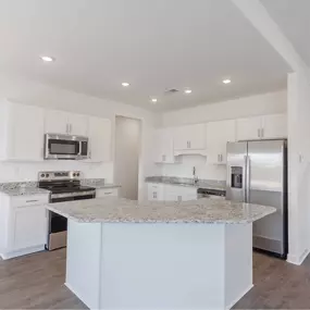 A traditional house features classic design, symmetrical facades, pitched roofs, and elegant details like columns and shutters. Inside, well-defined spaces offer comfort, craftsmanship, and timeless charm.