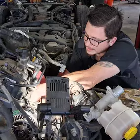 Percy at East End Automotive in Oak Ridge Fixing an Engine Issue