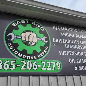 Close up of the Sign. East End Automotive in Oak Ridge, TN building exterior from the left. Your 5-Star Local Mechanic.