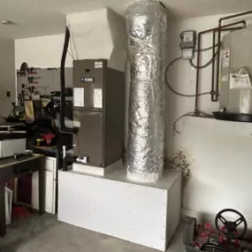 York mini-split system installed in a Deltona, FL side yard. Compact and efficient with clean concrete pad mounting and proper clearance from fencing for optimal airflow.