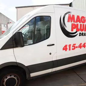 Magic Plumbing Heating & Cooling truck wrapped with the logo and phone number