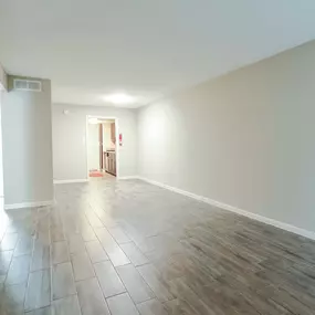 Living room area with wood floors