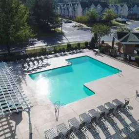 Pool with expansive sundeck and seating.